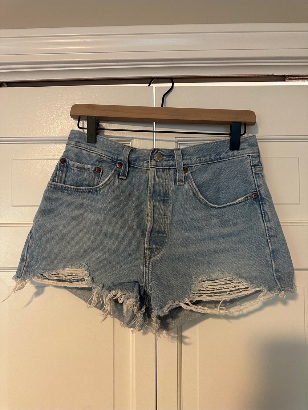 Levi’s High-Rise Light Blue Distressed Denim Shorts